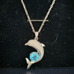 Blue topaz dophin pendant brand new